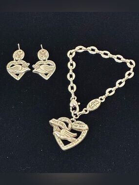 Brighton "Love Finds a Way" dove heart charm bracelet and matching earrings.